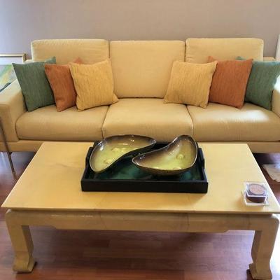 Yellow and Chrome Sofa. Marble table