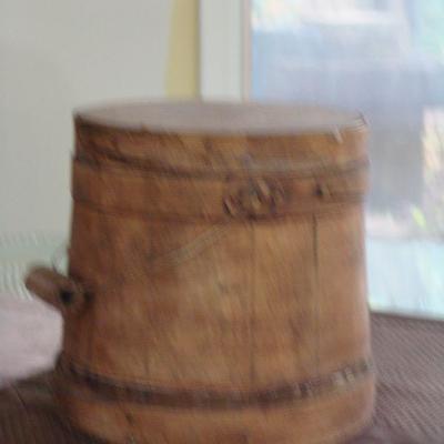 Old wooden container with lid