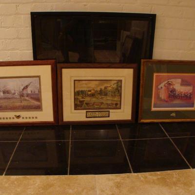 Assorted framed art prints