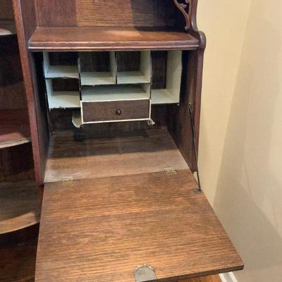 Vintage 3 drawer Oak Secretary with glass pull cabinet, hand carved scrolling.      