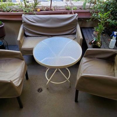 1900: Patio Set, 3 Chairs, 1 Table, and Outdoor Coffee Table
Table measures approximately 26.5