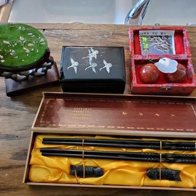 572: Decorative Asian Chopsticks, Keepsake box, Weighted Balls, Glass piece
Decorative Asian Chopsticks, Keepsake box, Weighted Balls,...
