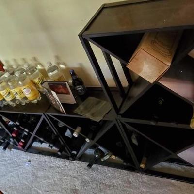 598: Five Piece Wine rack w/ Various bottles of wine and other Spirits
Five Piece Wine rack w/ Various bottles of wine and other Spirits