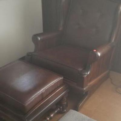Leather chair with wood and matching ottoman $50