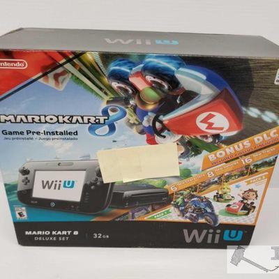 New, Wii U Mario Kart 8 Deluxe Set
New, Wii U Mario Kart 8 Deluxe Set. 32GB memory for Wii U Console 
OS15-254301.7
