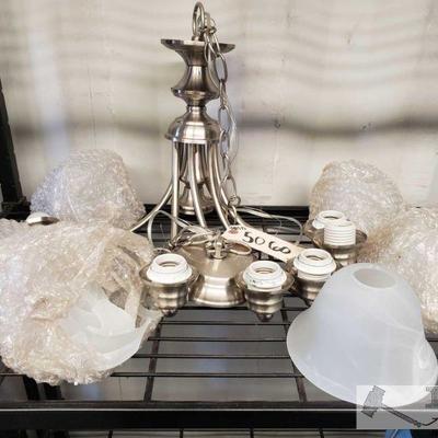 Metal Lighting Fixture w/ six glass shades
Metal Lighting Fixture w/ six glass shades(one shade broken)