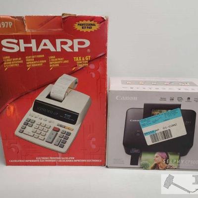 Canon Photo Printer and Sharp Electronic Printing Calculator
Canon Photo Printer and Sharp Electronic Printing Calculator