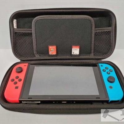 Nintendo Switch w/ Case and Two Games
Nintendo Switch w/ Case and Two Games. Games are Super Mario Odyssey and Fifa19 
OS19-008563.1(4 of 4)