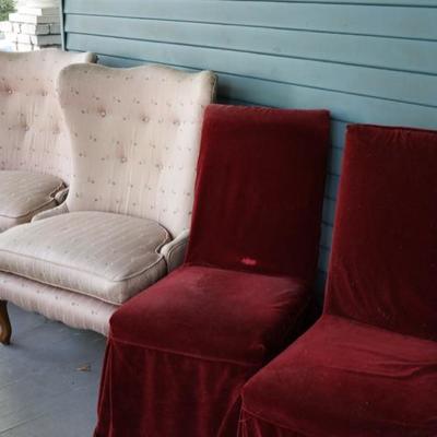 set of antique wing chairs and banquet chairs
