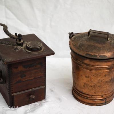 antique coffee grinder mill and copper bucket