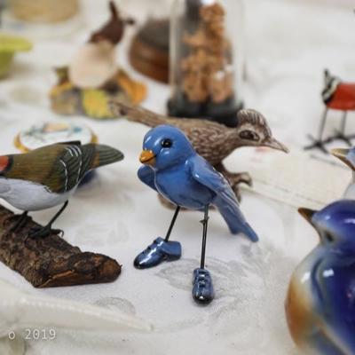 large collection of vintage bird figurines