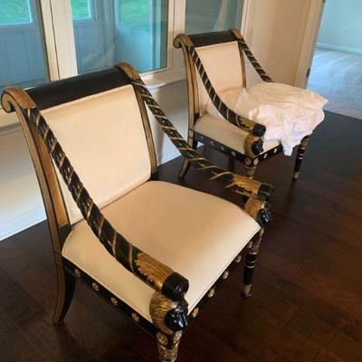 Pair of Neoclassical Egyptian Revival Black and Gold Chairs 