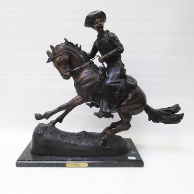 Large Bronze Sculpture After Frederic Remington Entitled â€œThe Cowboyâ€  