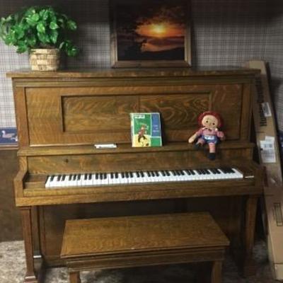 Upright Piano
Bring loading help, in the basement 