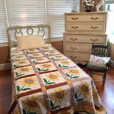 Twin Bed with Sunflower Quilt