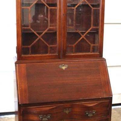 One of Several Mahogany Serpentine Front Ball and Claw Secretary with Bookcase Top

Auction Estimate $100-$300 â€“ Located Inside