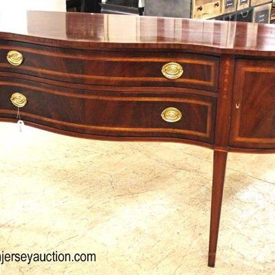 Burl Mahogany and Banded Serpentine Taper Leg Buffet

Auction Estimate $400-$800 – Located Inside

 
