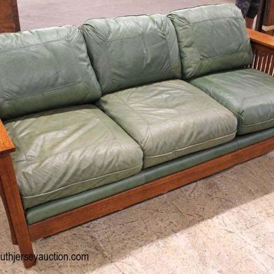 Oak Mission Style Even Arm Sofa with Leather Cushions

Auction Estimate $300-$600 â€“ Located Inside