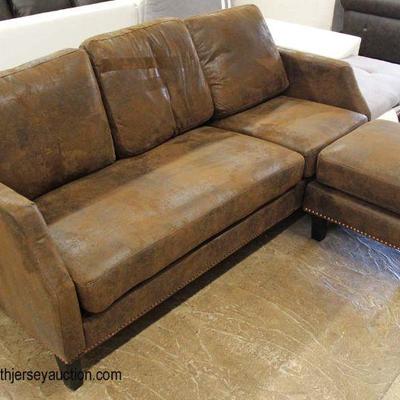 NEW â€œAbbyson Furnitureâ€ Suede 3 Section Sectional Sofa Chaise

Auction Estimate $300-$600 â€“ Located Inside