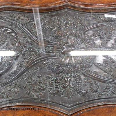 Mahogany Frame Metal Decorated Glass Top Coffee Table in the Manner of Maitland Smith

Auction Estimate $200-$400 â€“ Located Inside