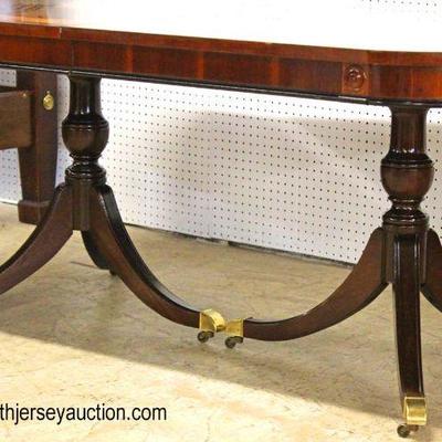 7 Piece Burl Mahogany Banded and Inlaid Dining Room Table with 6 Medalian Back Chairs â€“ Table has 2 Leaves

Auction Estimate $400-$800...