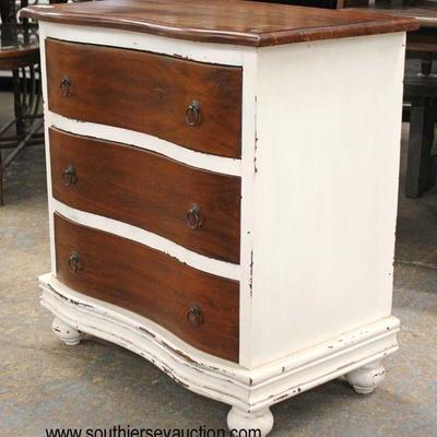 Mahogany and Painted 3 Drawer Serpentine Front 3 Drawer Bachelor Chest

Auction Estimate $100-$200 â€“ Located Inside