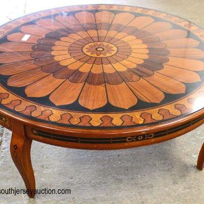 FANCY Multi Wood Inlaid Round Coffee Table in the Manner of Maitland Smith

Auction Estimate $200-$400 â€“ Located Inside