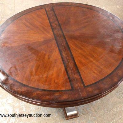 7 Piece Contemporary Round Mahogany Banded and Inlaid Table and 6 Upholstered Chairs

Auction Estimate $200-$400 â€“ Located Inside