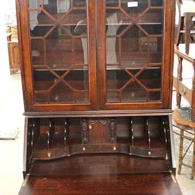 Mahogany Ball and Claw Serpentine Front Secretary with Bookcase Top

Auction Estimate $100-$300 â€“ Located Inside