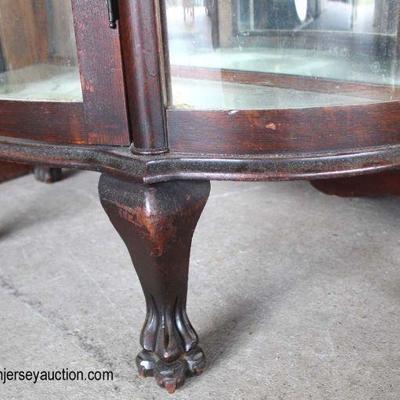 ANTIQUE Mahogany Paw Foot China Cabinet with Carved Griffins and Glass Shelves

Auction Estimate $100-$300 â€“ Located Dock