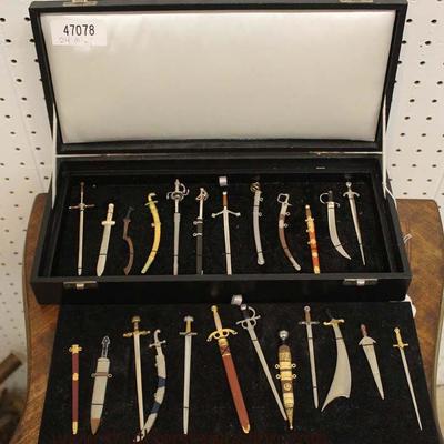  Set of 24 Miniature Swords in Case

Auction Estimate $50-$150 â€“ Located Glassware 