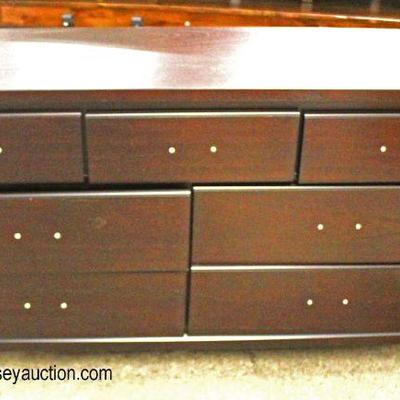 NEW Mahogany Finish Low Chest with Hardware in Drawers

Auction Estimate $100-$300 â€“ Located Inside