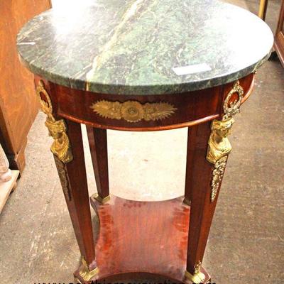 Mahogany Marble Top French Style Lamp Table with Applied Bronze

Auction Estimate $100-$300 â€“ Located Inside