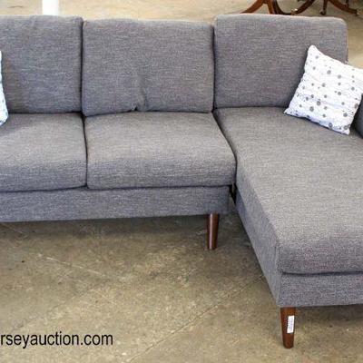  NEW 2 Section Upholstered Sofa Chaise with Decorative Pillows

Auction Estimate $300-$600 â€“ Located Inside

  
