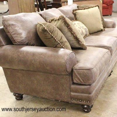  NEW Brown Suede Style Sofa with Decorative Pillows

Auction Estimate $300-$600 â€“ Located Inside 