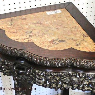 ANTIQUE Highly Carved Hardwood Asian Marble Top Corner Stand and Plant Stand

Auction Estimate $200-$400 â€“ Located Inside

 