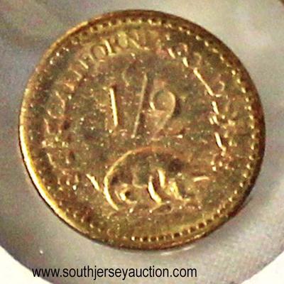  1852 California Â½ Gold Coin

Auction Estimate $100-$300 â€“ Located Glassware 
  