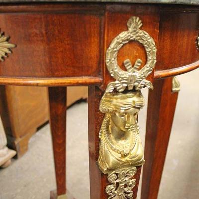 Mahogany Marble Top French Style Lamp Table with Applied Bronze

Auction Estimate $100-$300 â€“ Located Inside
