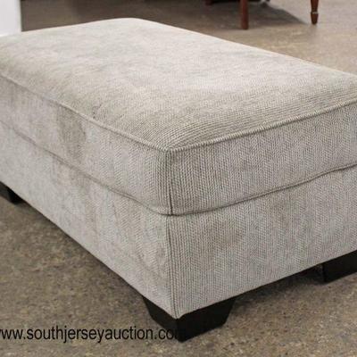  NEW Grey Upholstered Ottoman

Auction Estimate $100-$200 â€“ Located Inside 