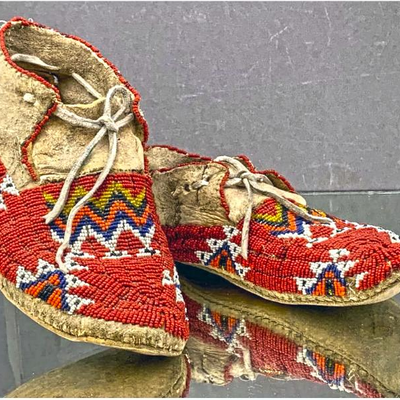 Fine pair of red beaded Native American moccasins. Estate sale price: $500