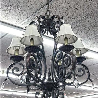 6-light wrought iron chandelier.