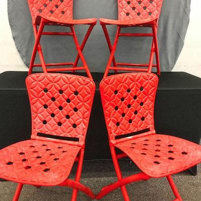 Red plastic outdoor chairs.