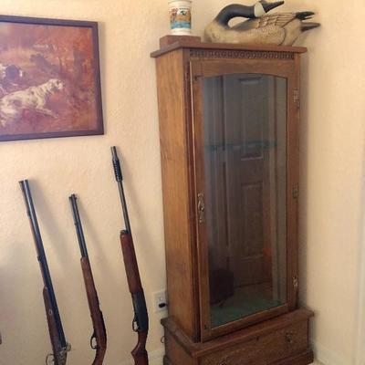 Locking/Lighted Wood 12-Gun Cabinet w/Glass Door & Ammo Drawer - $275  (29W  14D  64H)
