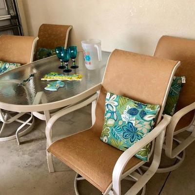 Suncoast Oval Glass-top Lanai Table w/4 Sling Swivel Rocking Chairs - $525