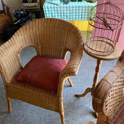 Wicker chairs and bird cage 