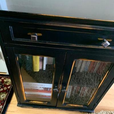 Black side table that matches the hutch and dining room table