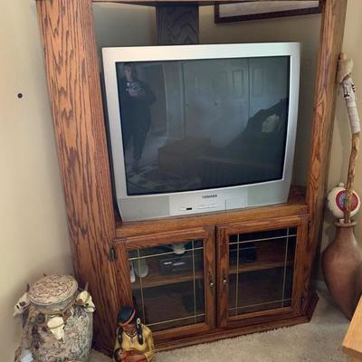 TV and cabinet with American Indian items