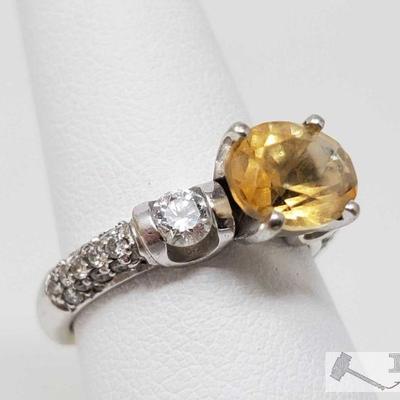 18k Gold Ring with Center Stone and Accent Diamonds, 6.2g
Weighs approx 6.2g, approx size 7 Center Stone is unknown, stones on Band are...