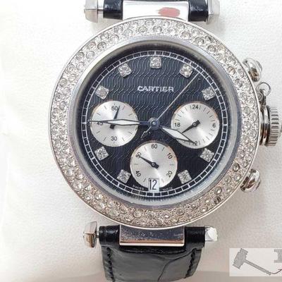534: Cartier Swiss Made Wrist Watch
Measures approx 43mm
