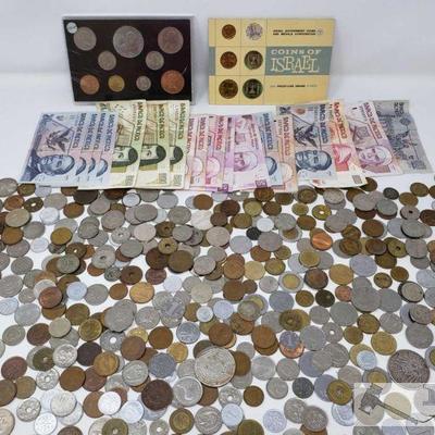 1184: Assorted Foreign Paper Money and Coins
Assorted paper money from Mexico and coins that are Foreign from Israel, Mexico and serveral...